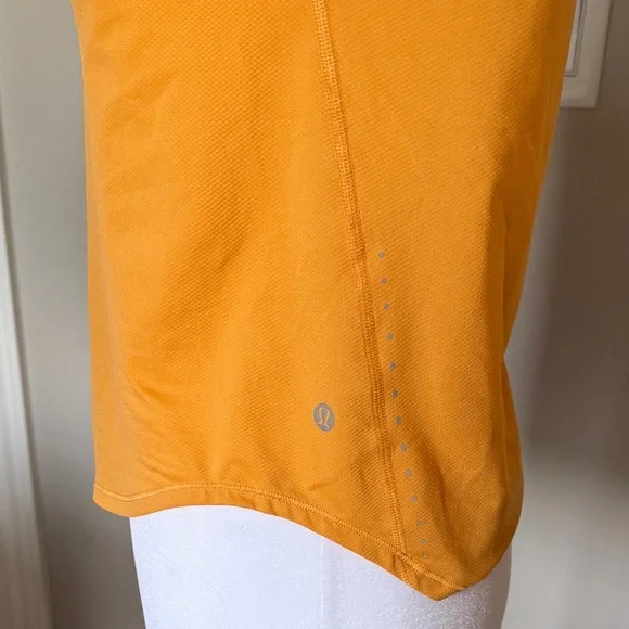 lululemon high neck running and training t-shirt, color
Mango dream, size 2. - Picture 3 of 4